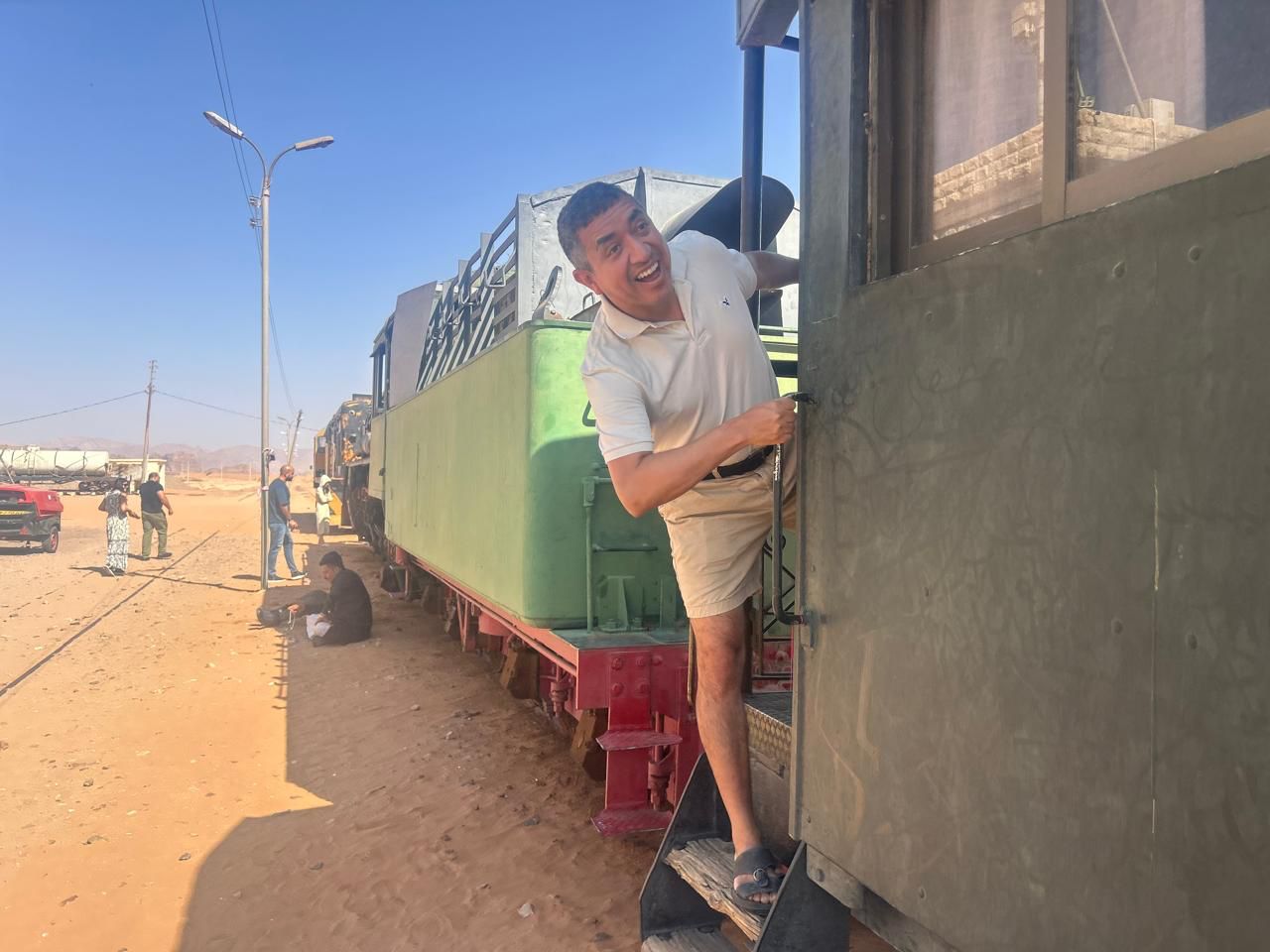 Francisco Rodríguez-Henríquez leaning out from a train