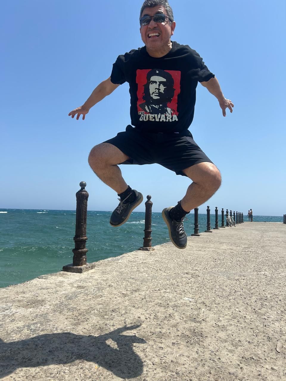 Francisco Rodríguez-Henríquez jumping by the sea